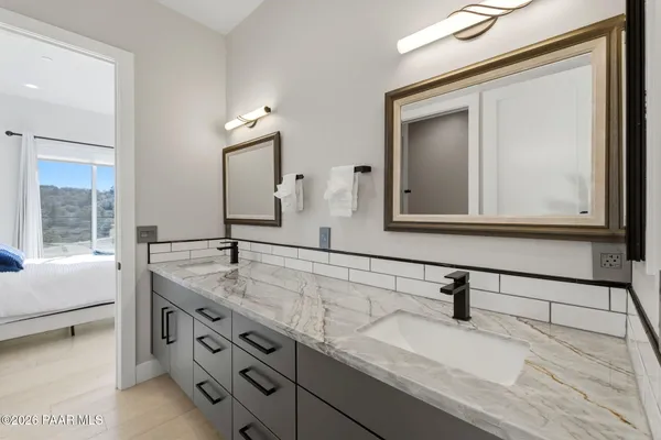 a view of a hallway with staircase