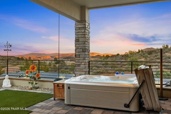 a view of a terrace with furniture and a terrace view