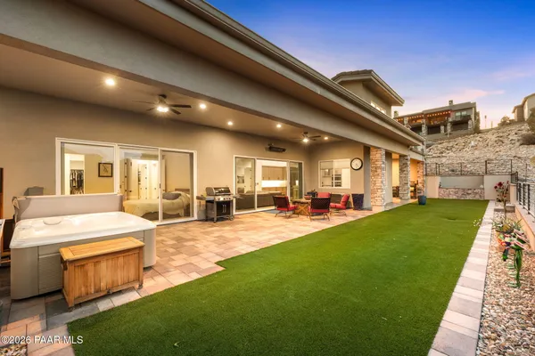 a view of building with mountains in the background