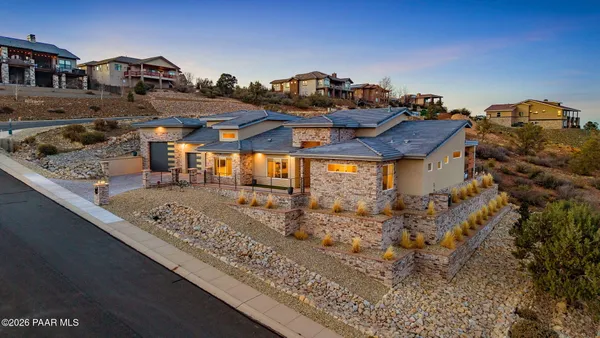 a view of a town with large trees