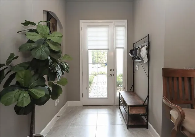 a kitchen with stainless steel appliances kitchen island granite countertop a stove and a refrigerator