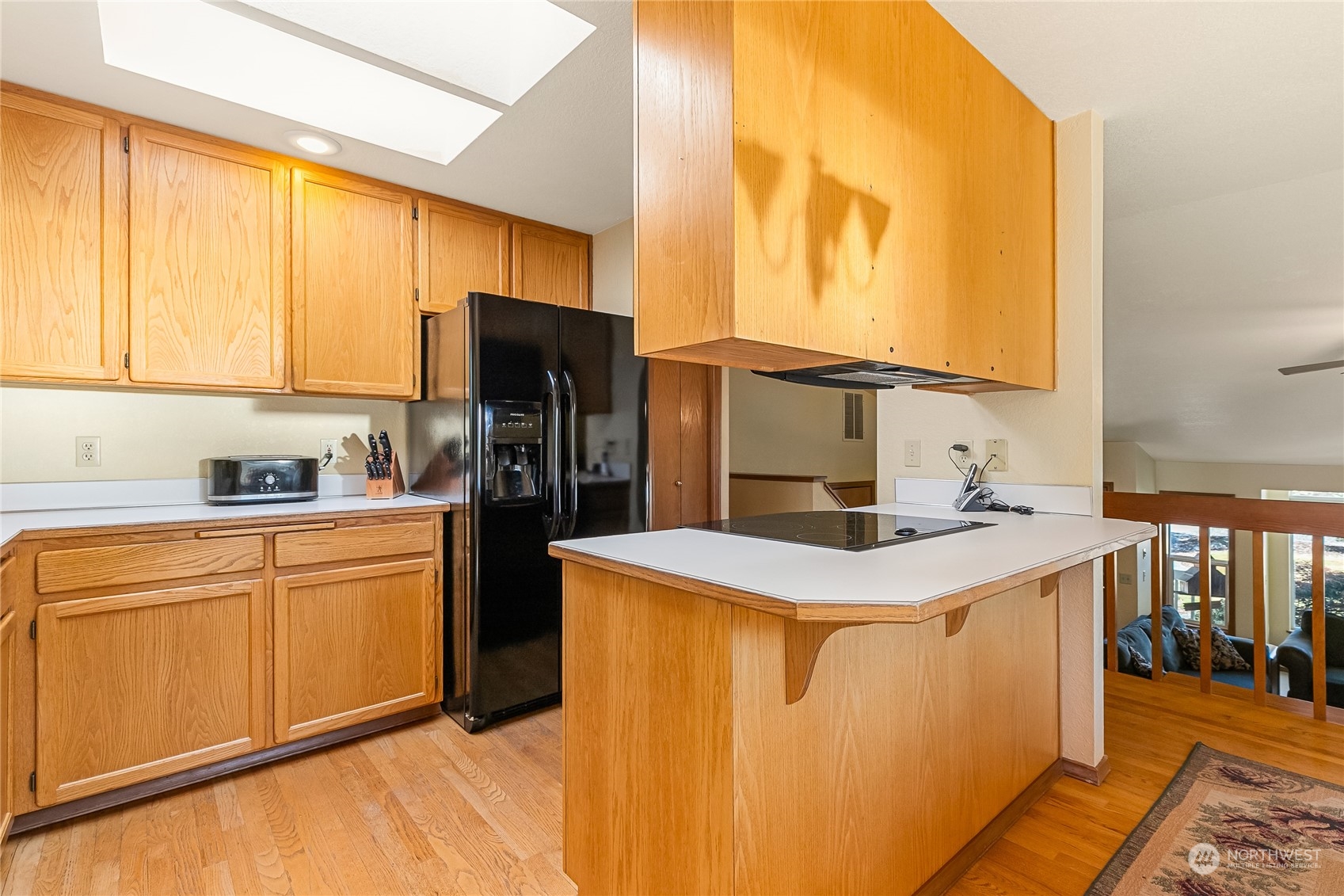 1388 Welling Road Bellingham, WA 98226 - Photo 12 of 40 a kitchen with stainless steel appliances granite countertop a sink stove and refrigerator