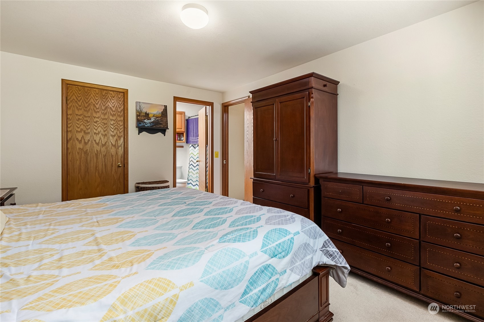1388 Welling Road Bellingham, WA 98226 - Photo 21 of 40 a bedroom with a bed and a dresser