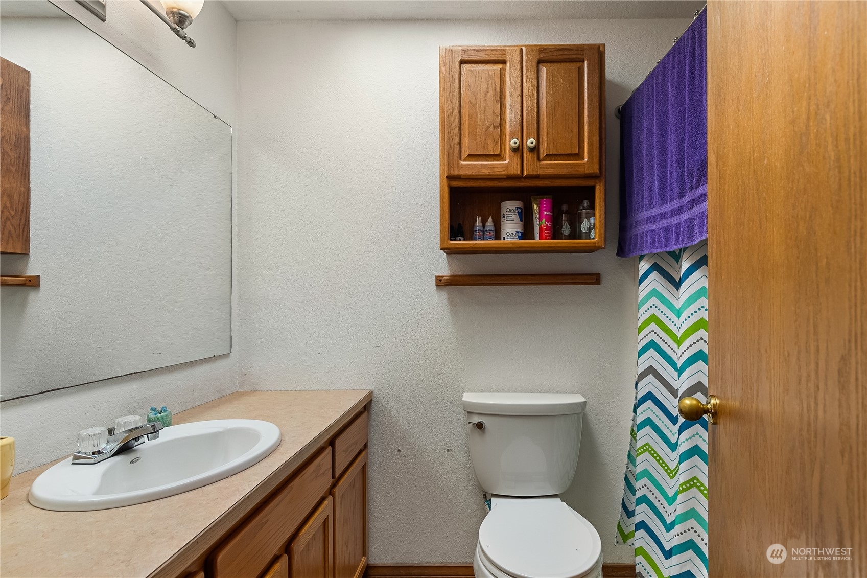 1388 Welling Road Bellingham, WA 98226 - Photo 23 of 40 a bathroom with a sink toilet and mirror