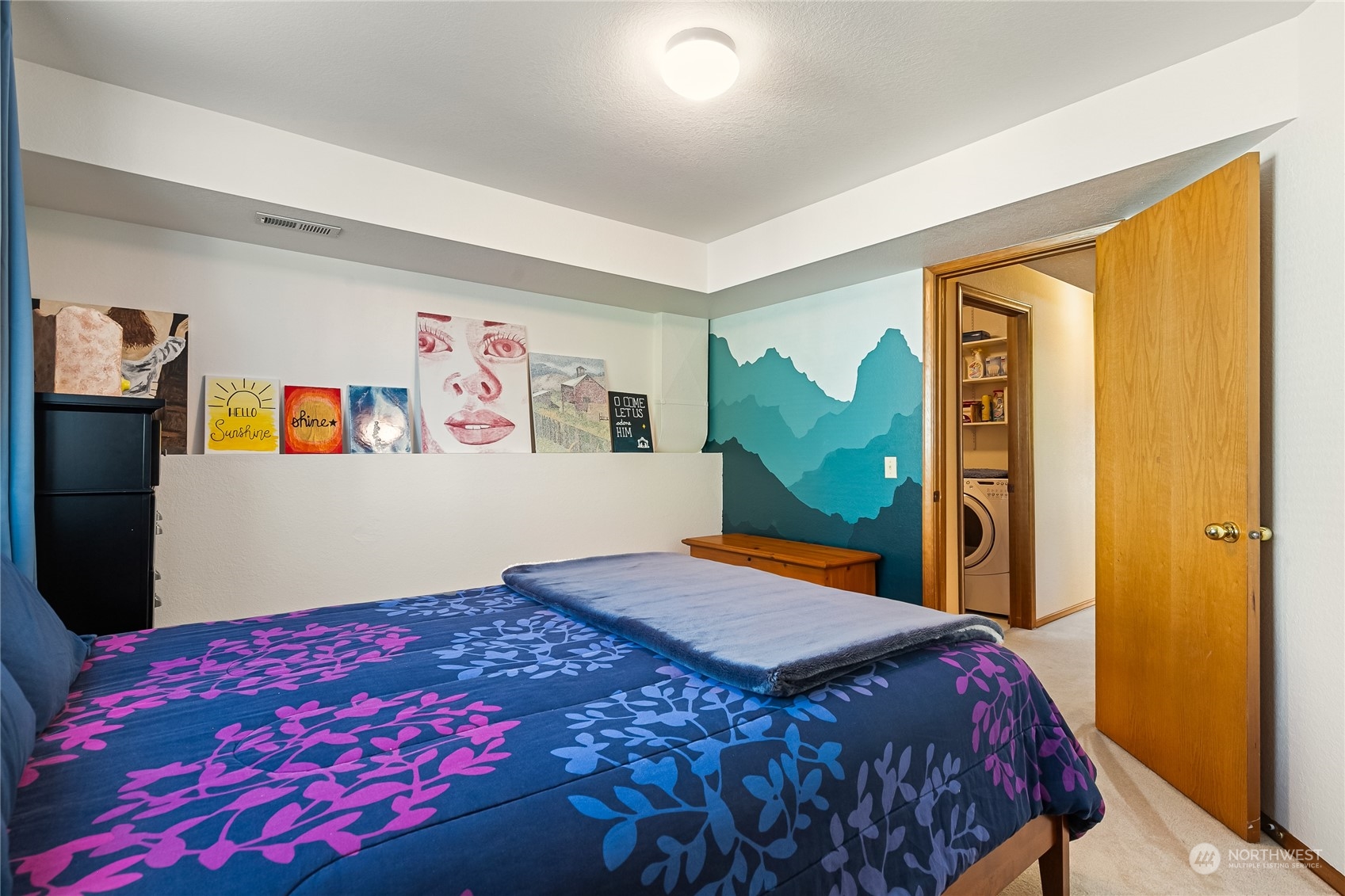 1388 Welling Road Bellingham, WA 98226 - Photo 27 of 40 a bedroom with a bed and a dresser