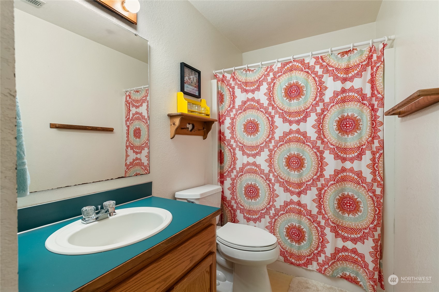 1388 Welling Road Bellingham, WA 98226 - Photo 28 of 40 a bathroom with a sink and a mirror