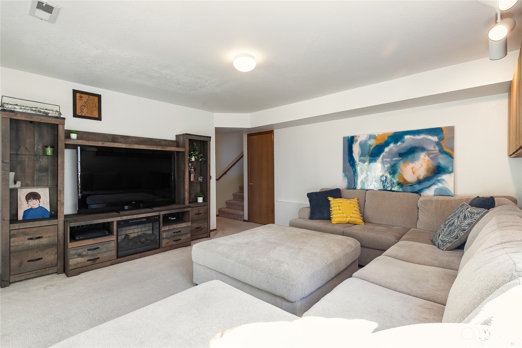 1388 Welling Road Bellingham, WA 98226 - Photo 31 of 40 a living room with furniture and a flat screen tv