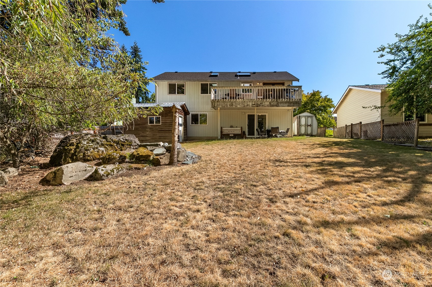 1388 Welling Road Bellingham, WA 98226 - Photo 39 of 40 a view of a house with a yard