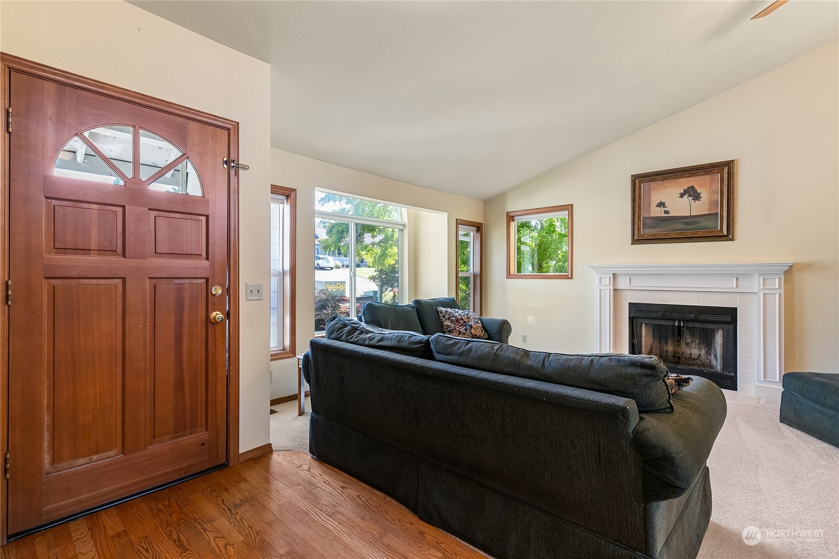 1388 Welling Road Bellingham, WA 98226 - Photo 6 of 40 a living room with furniture and a fireplace