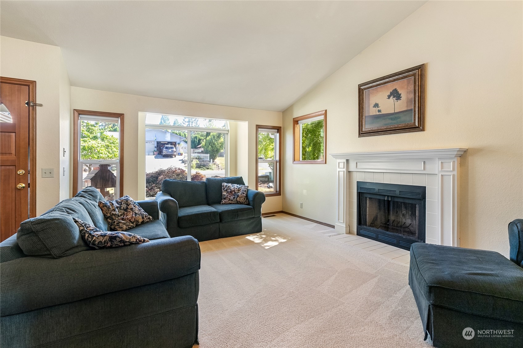 1388 Welling Road Bellingham, WA 98226 - Photo 7 of 40 a living room with furniture and a fireplace