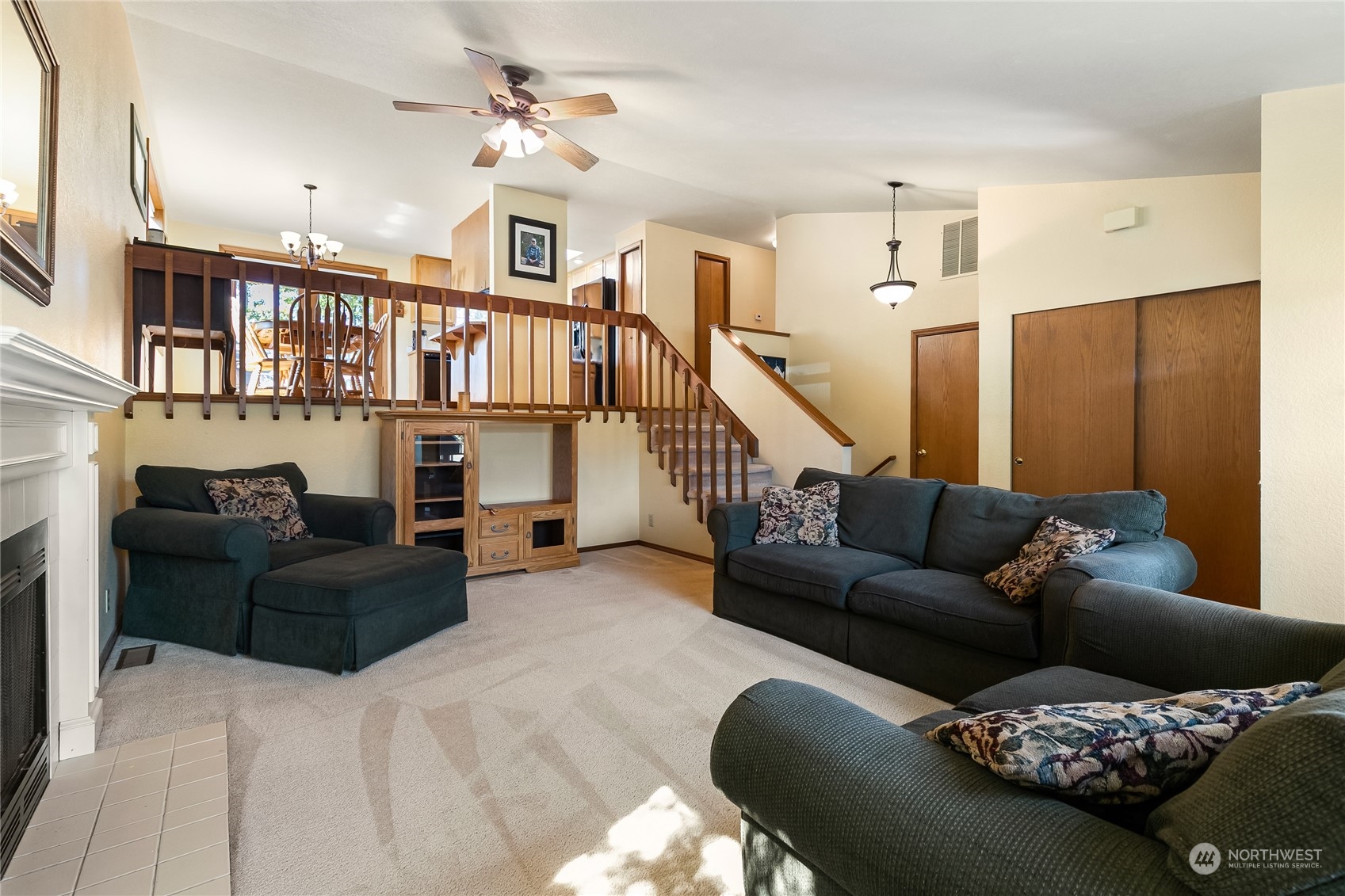 1388 Welling Road Bellingham, WA 98226 - Photo 8 of 40 a living room with furniture ceiling fan and a rug