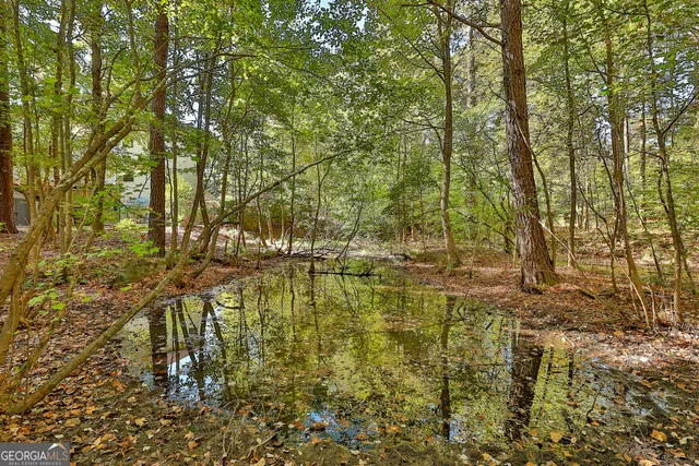 a view of balcony with wooden floor