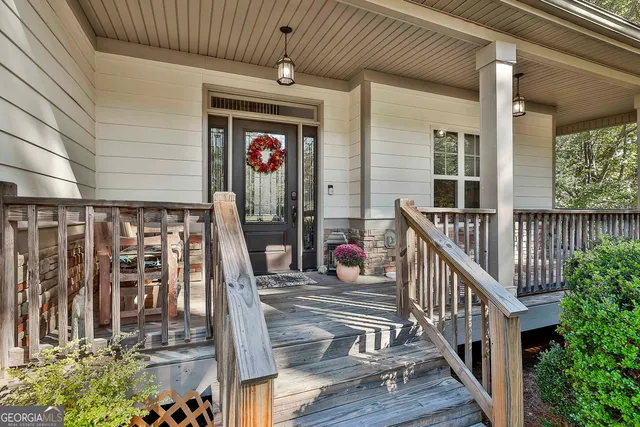 a view of large trees with yard