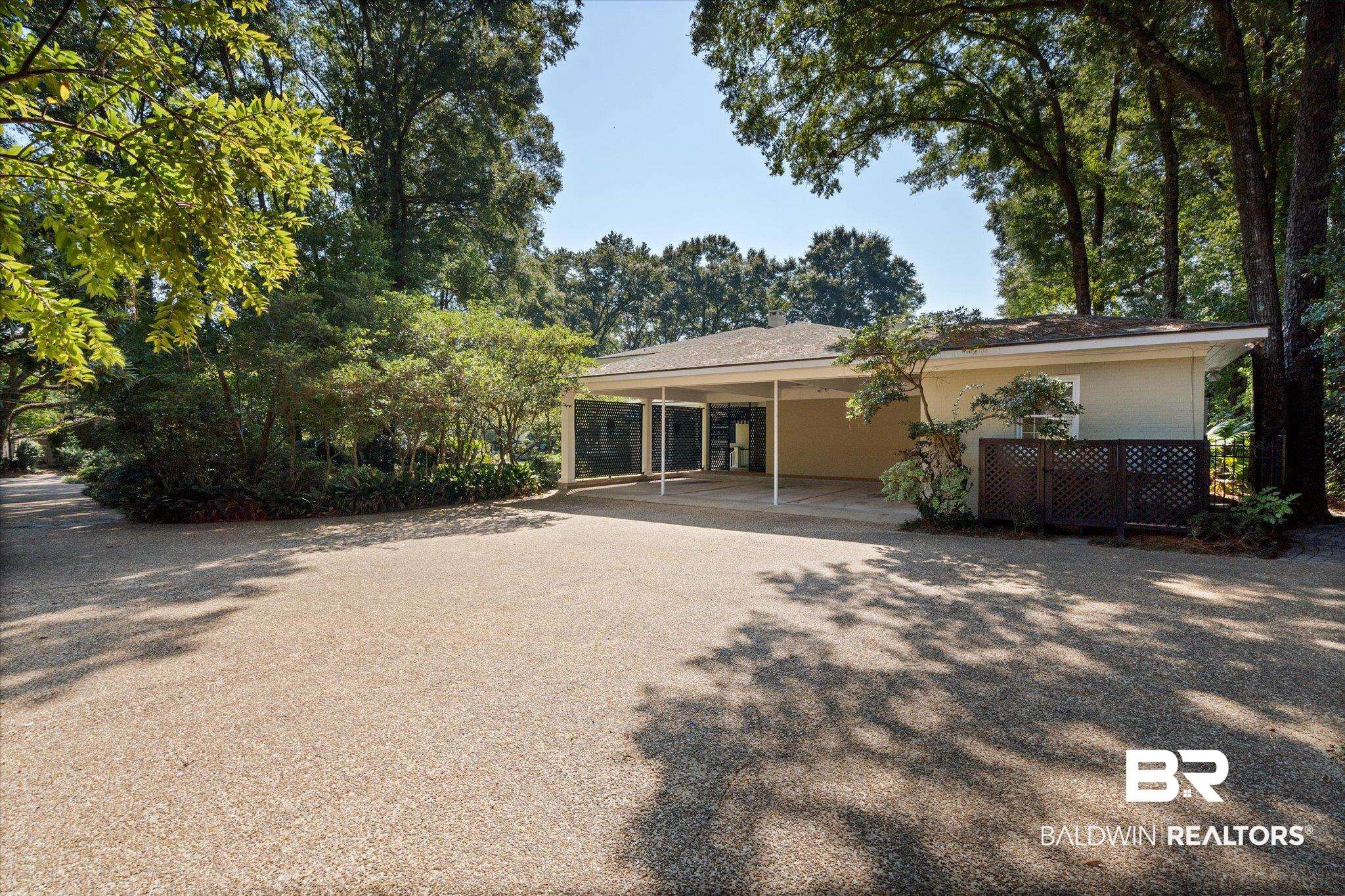 54 Turnin Lane Mobile, AL 36608 - Photo 32 of 35 Rear view of property with a carport