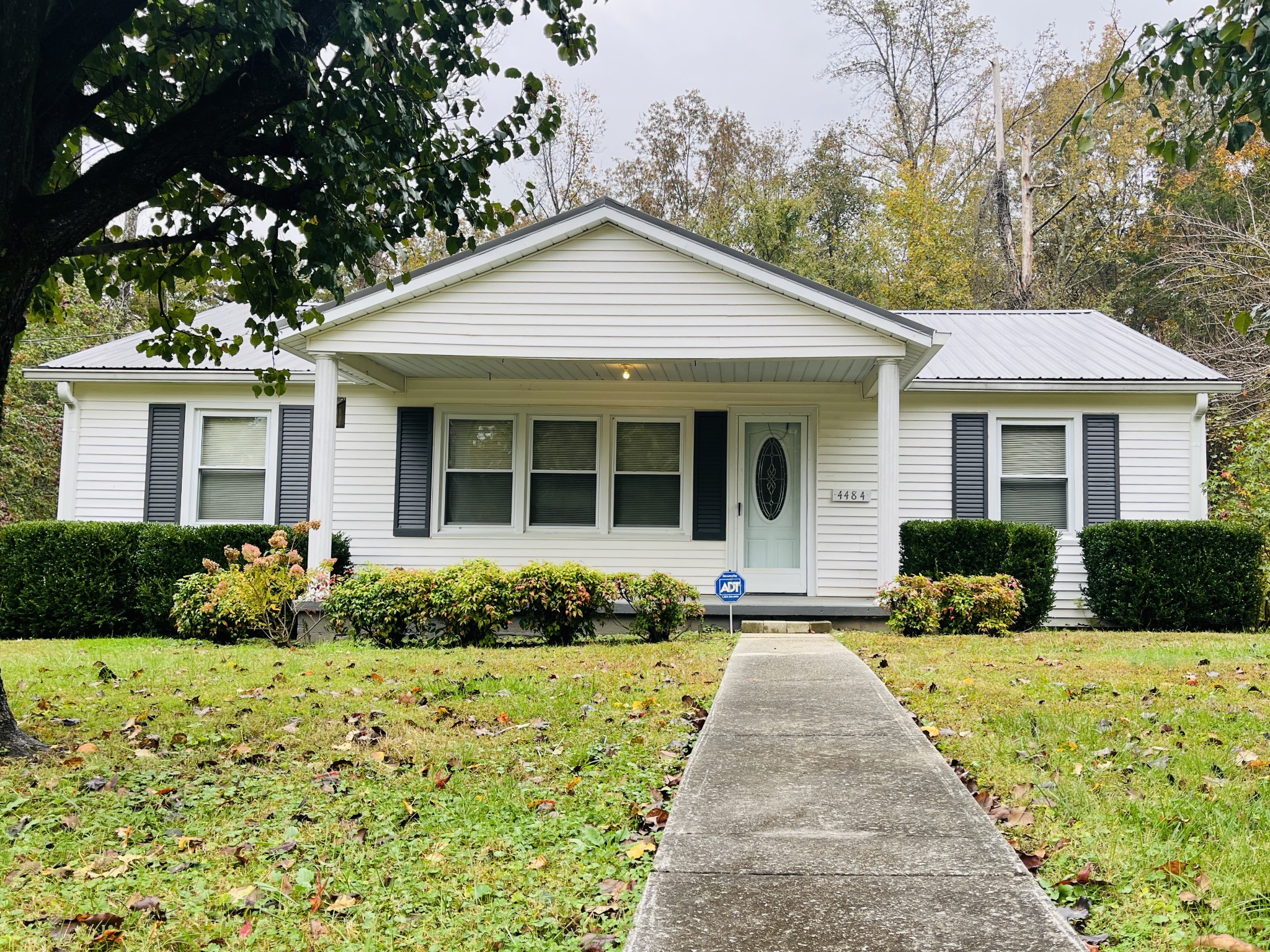 4484 Jefferson Road Smithville, TN 37166 - Photo 1 of 18 a front view of a house with a yard