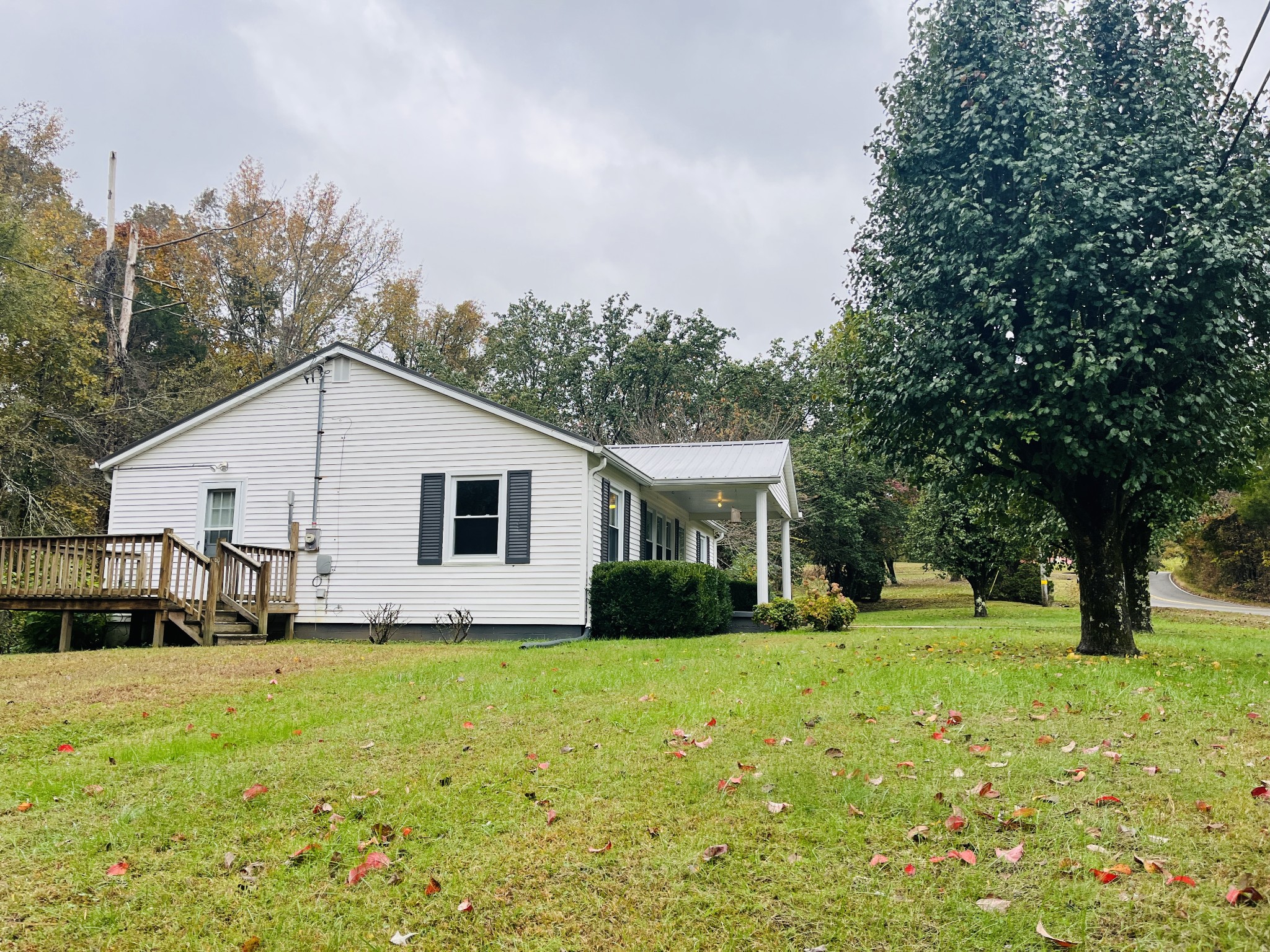 4484 Jefferson Road Smithville, TN 37166 - Photo 13 of 18 a view of a house with yard and tree s