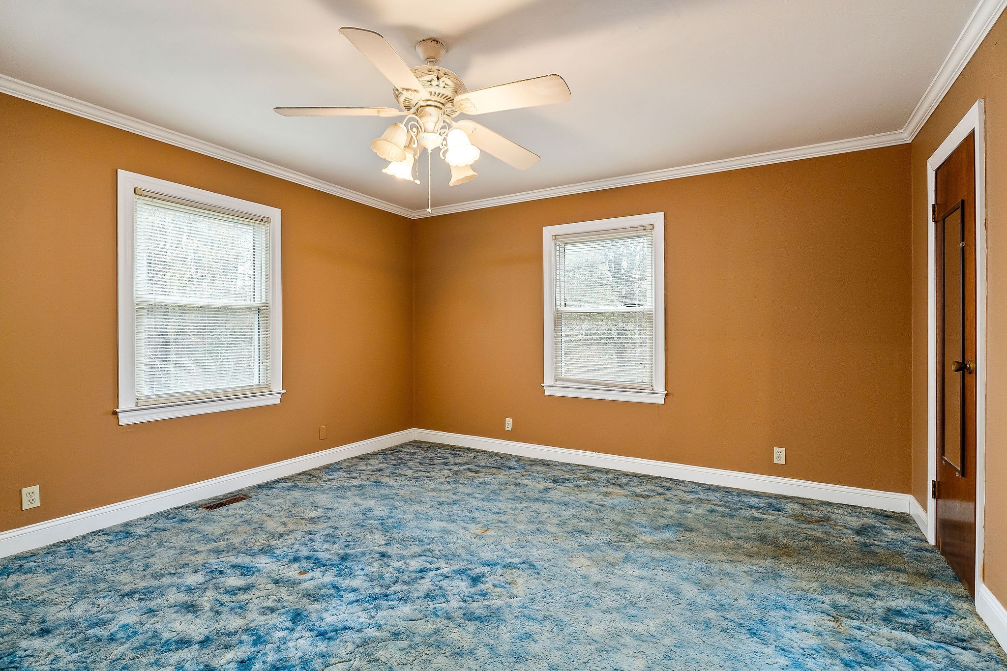 4484 Jefferson Road Smithville, TN 37166 - Photo 9 of 18 a view of an empty room with chandelier fan and fire place