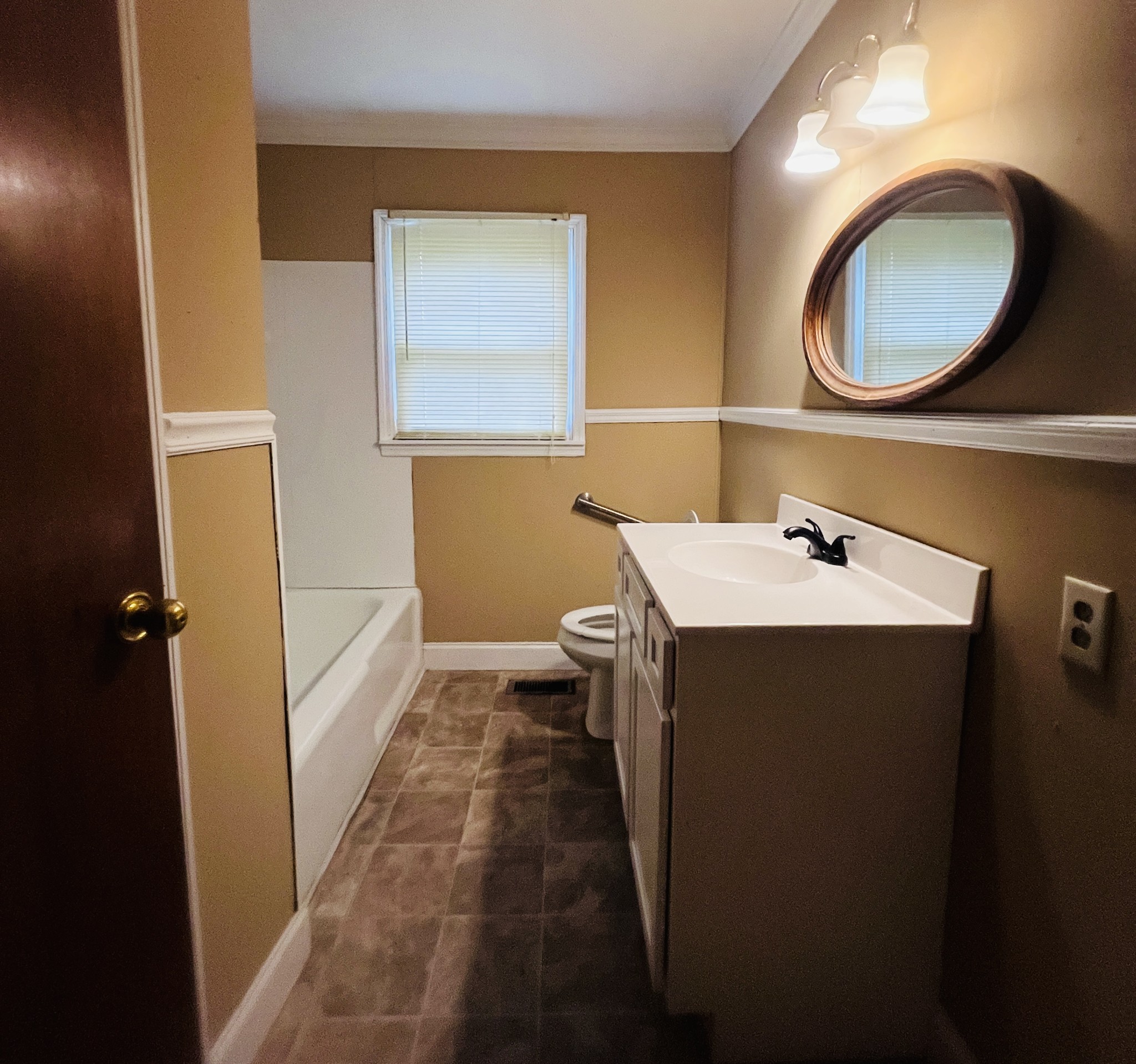 4484 Jefferson Road Smithville, TN 37166 - Photo 10 of 18 a bathroom with a sink and a mirror