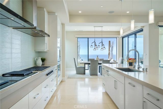 a spacious bedroom with a bed and a couch