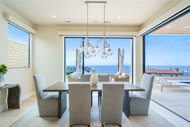 a spacious bedroom with a large bed and furniture