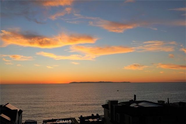 a view of a house with a street