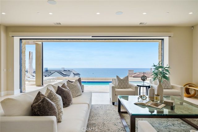 a room with a wooden floor and pool table