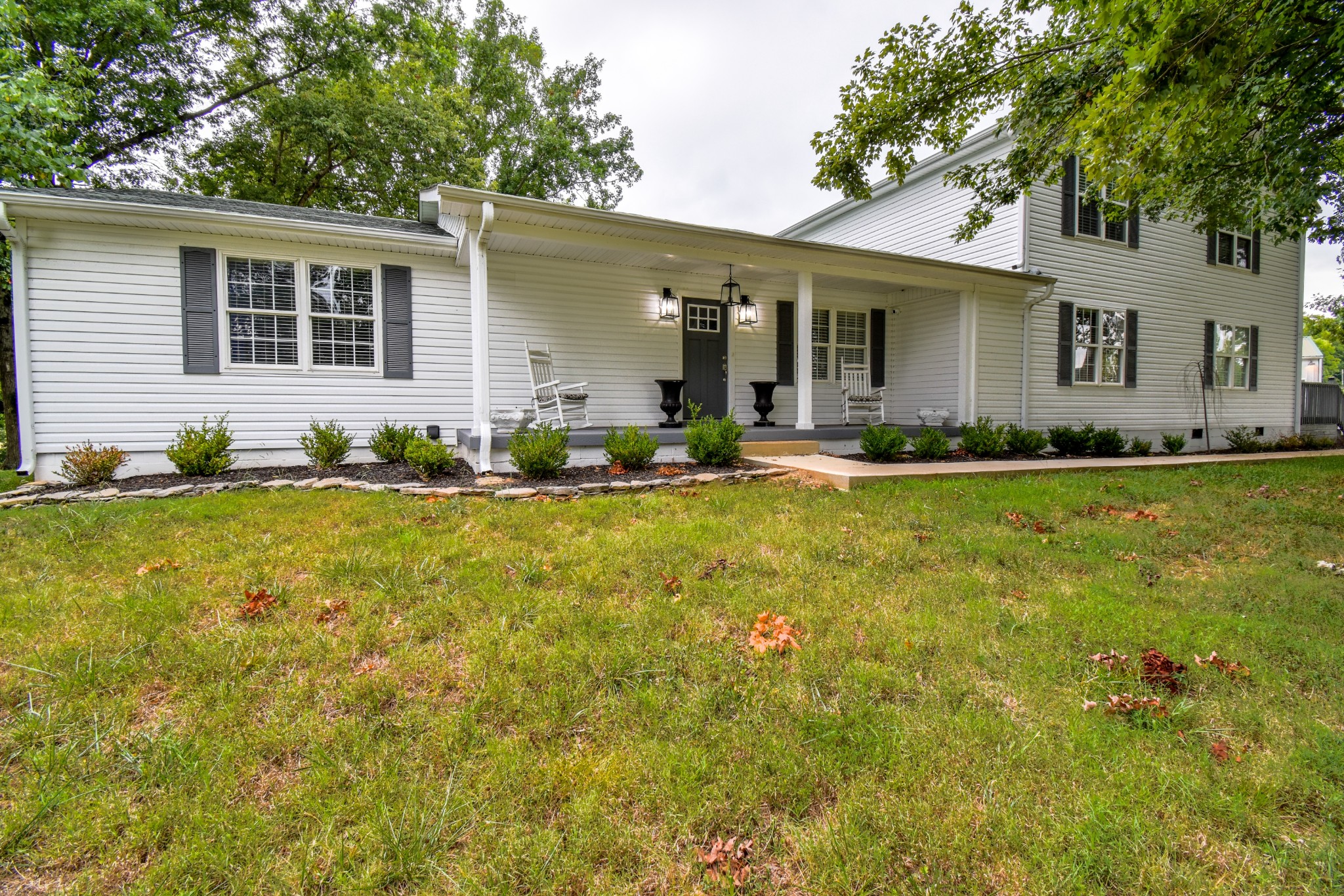 1000 Five Points Road Pulaski, TN 38478 - Photo 1 of 50 a front view of a house with swimming pool and yard