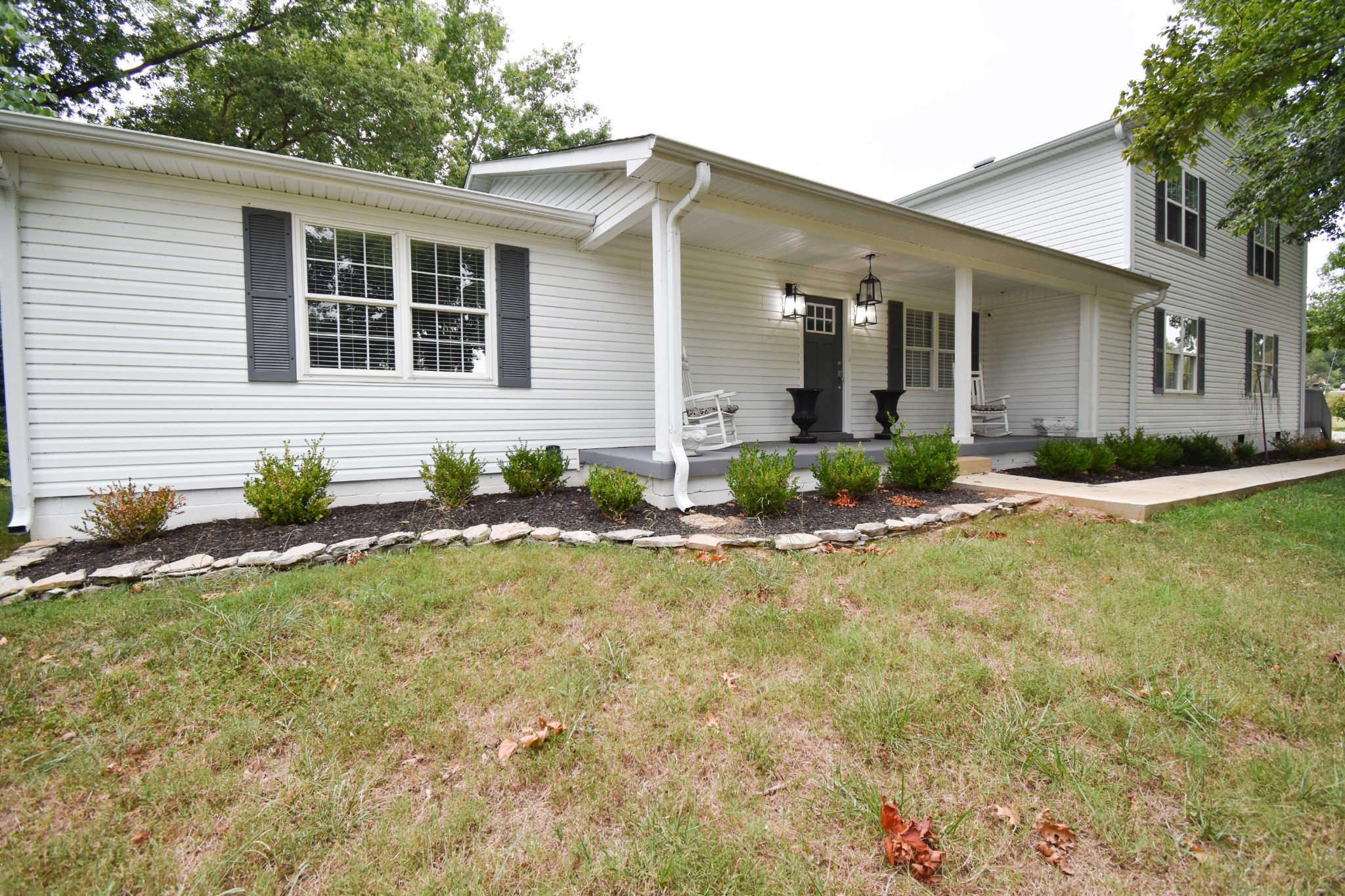 1000 Five Points Road Pulaski, TN 38478 - Photo 2 of 50 a front view of a house with garden