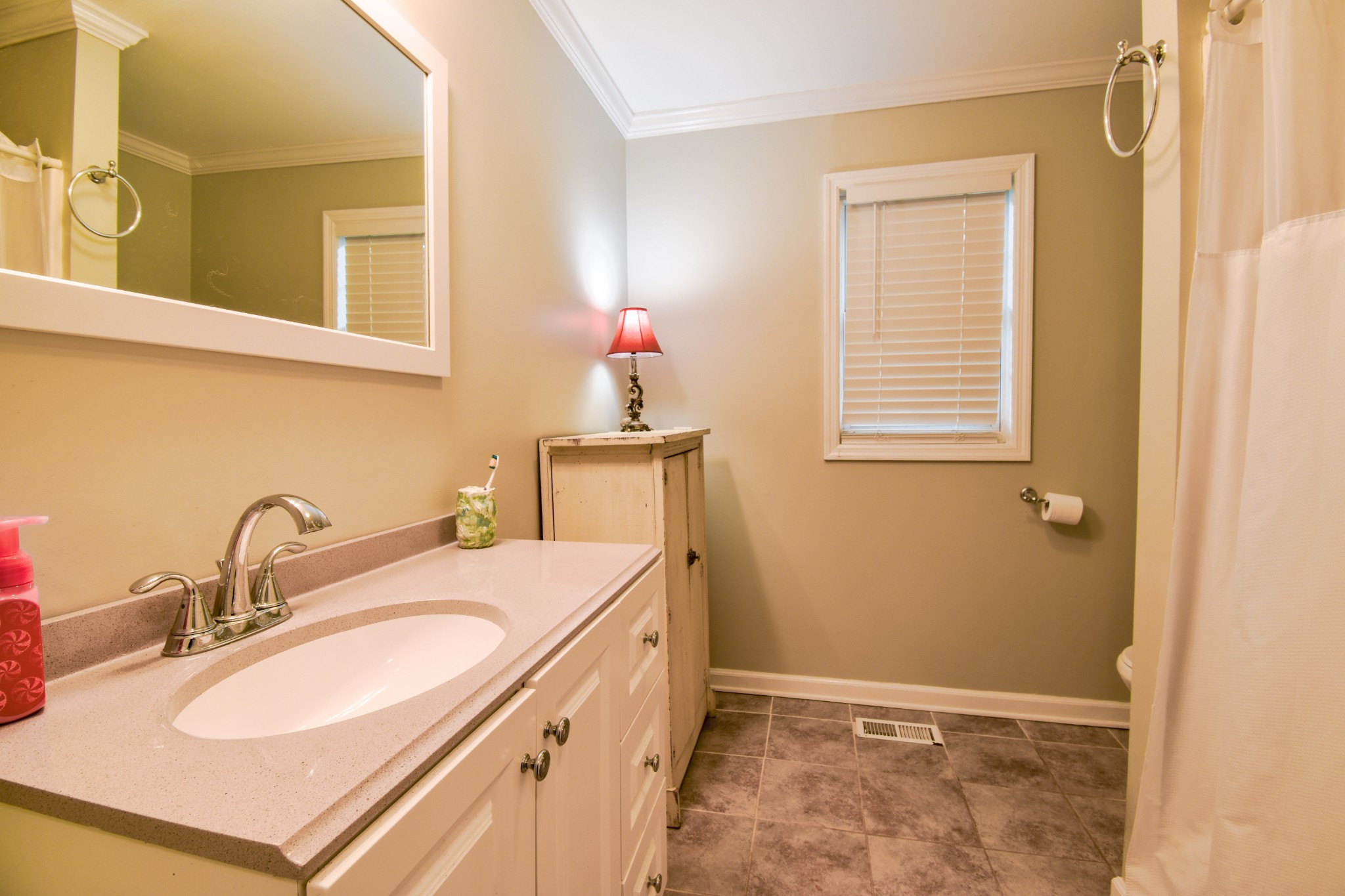 1000 Five Points Road Pulaski, TN 38478 - Photo 45 of 50 a bathroom with a sink and a mirror