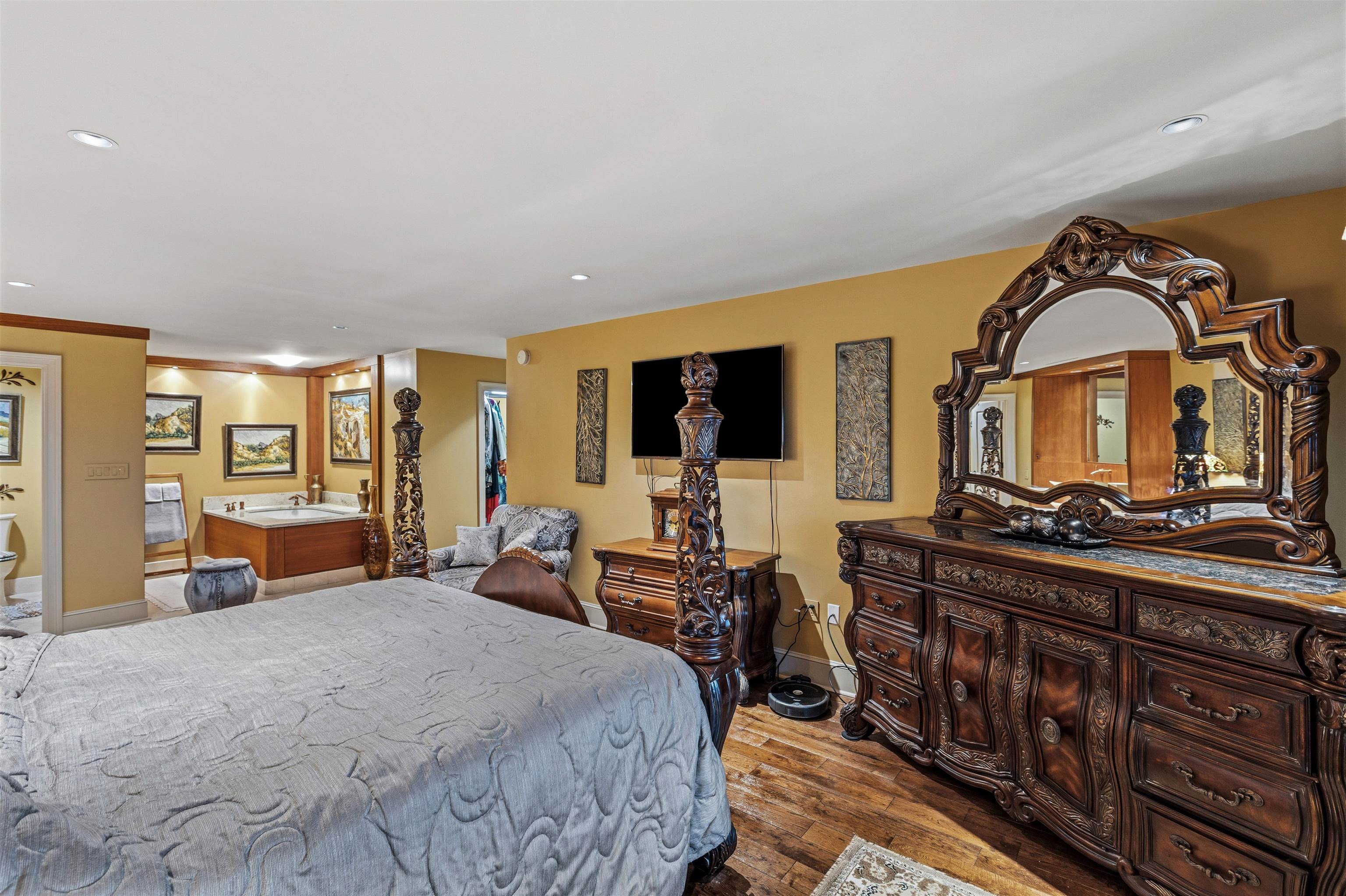 655 Riverside Drive, Unit 1208 Memphis, TN 38103 - Photo 21 of 29 Bedroom featuring dark wood-style floors and recessed lighting