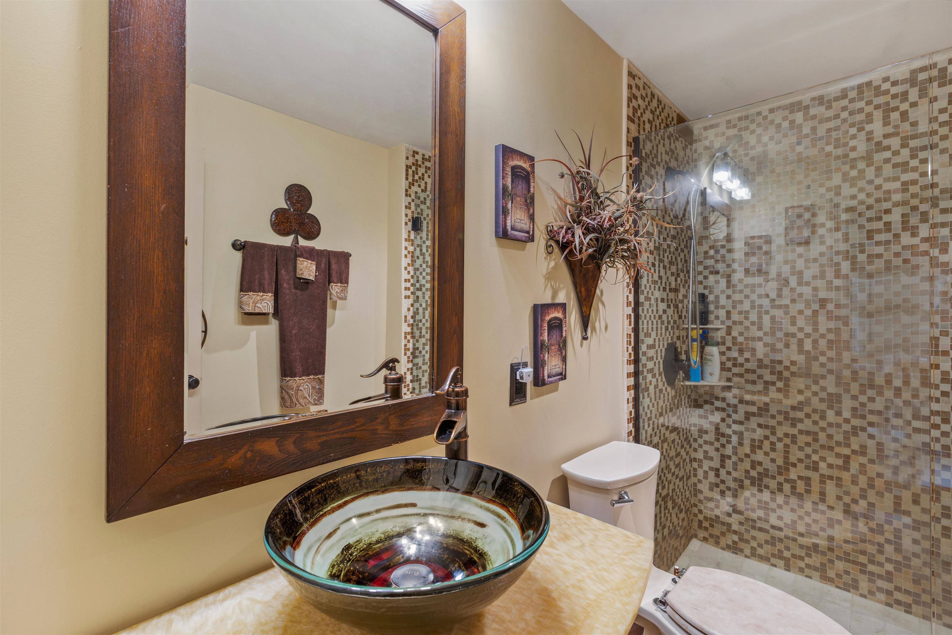 655 Riverside Drive, Unit 1208 Memphis, TN 38103 - Photo 22 of 29 Bathroom with vanity and a tile shower