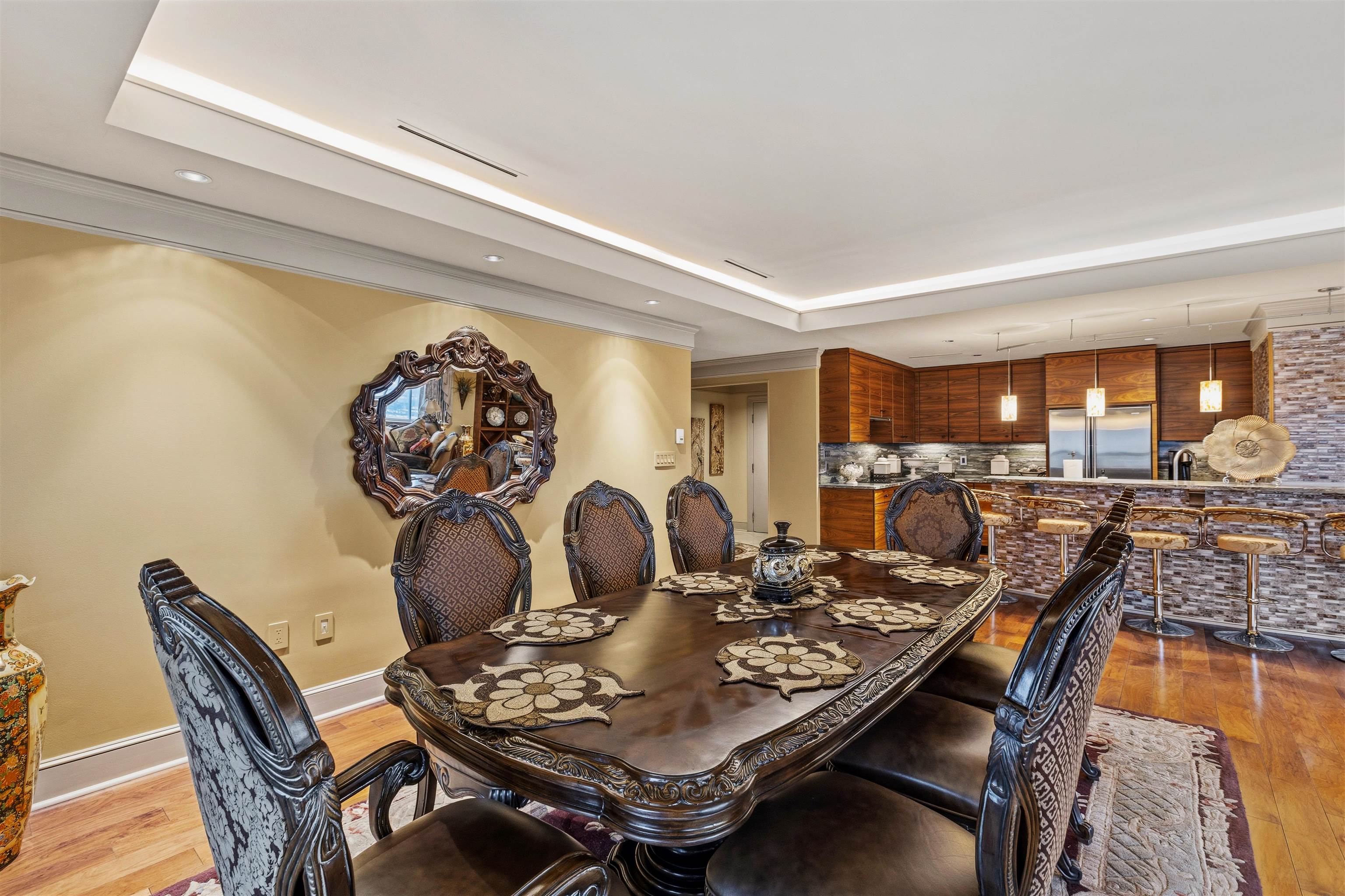 655 Riverside Drive, Unit 1208 Memphis, TN 38103 - Photo 9 of 29 Dining area with light wood-style floors, crown molding, a raised ceiling, and recessed lighting
