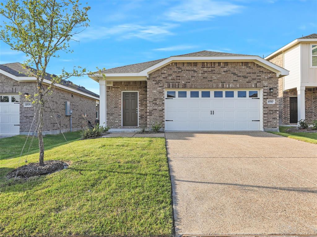 4510 Winecup Road Melissa, TX 75454 - Photo 1 of 22 Brick exterior with an attached garage and a concrete driveway