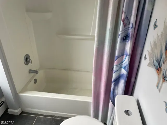 a view of a bathtub in a bathroom