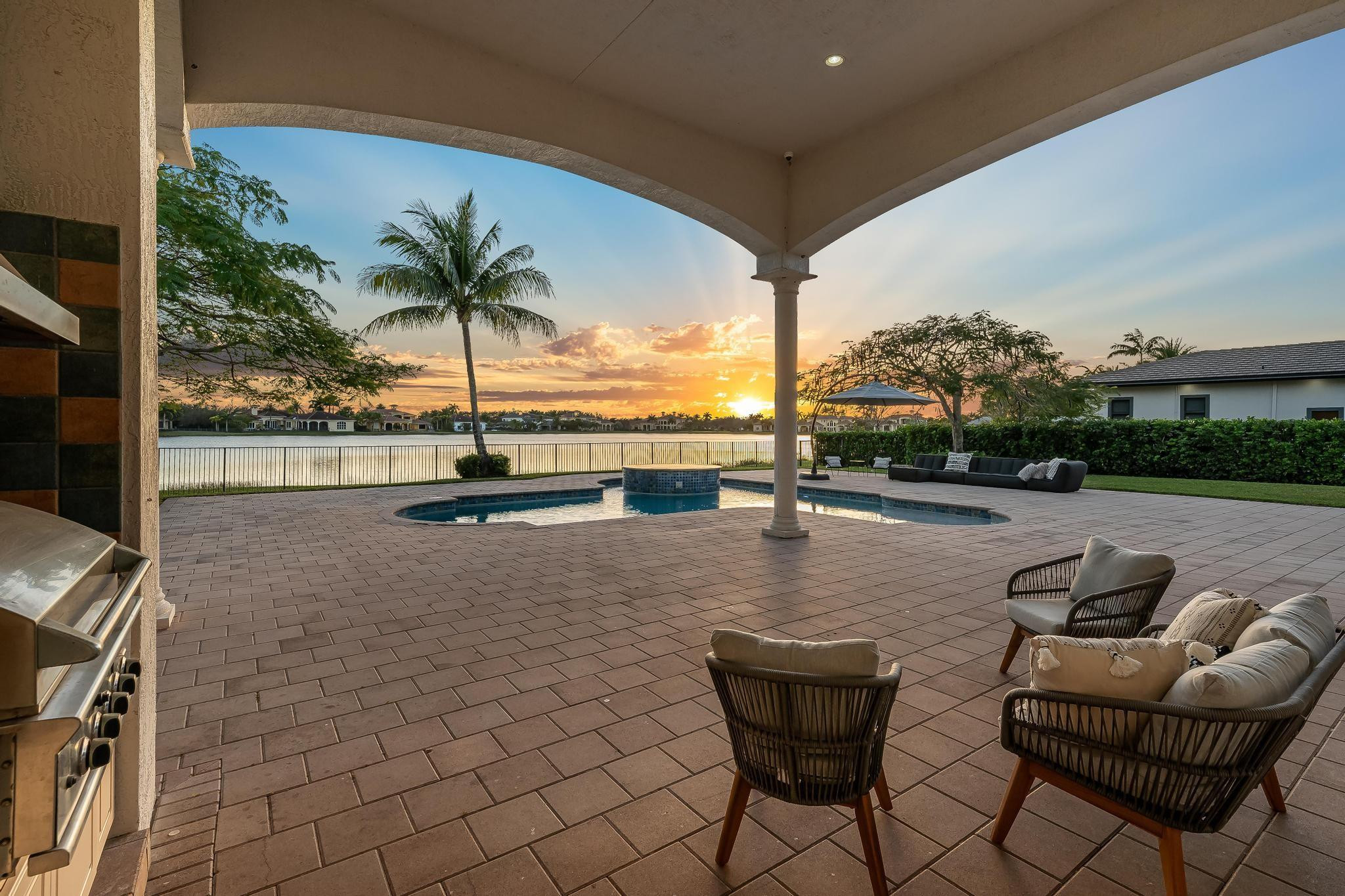 3111 Lake Ridge Lane Weston, FL 33332 - Photo 17 of 21 a view of swimming pool with outdoor seating