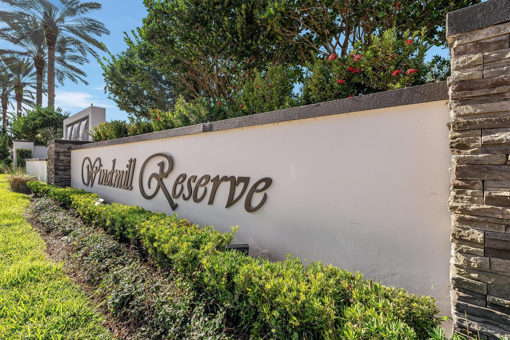 3111 Lake Ridge Lane Weston, FL 33332 - Photo 21 of 21 a sign on the side of a building