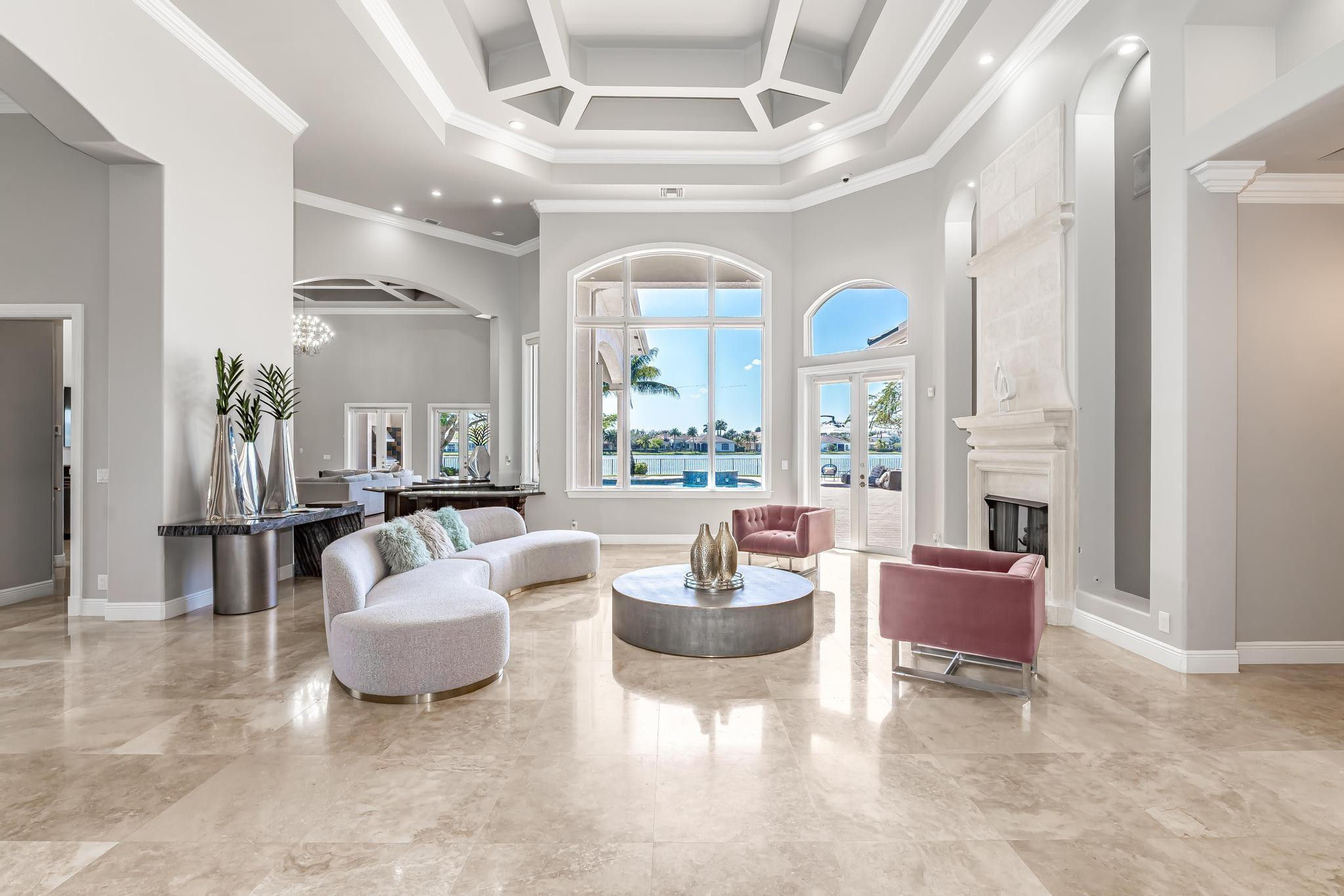 3111 Lake Ridge Lane Weston, FL 33332 - Photo 6 of 21 a living room with furniture and a large window