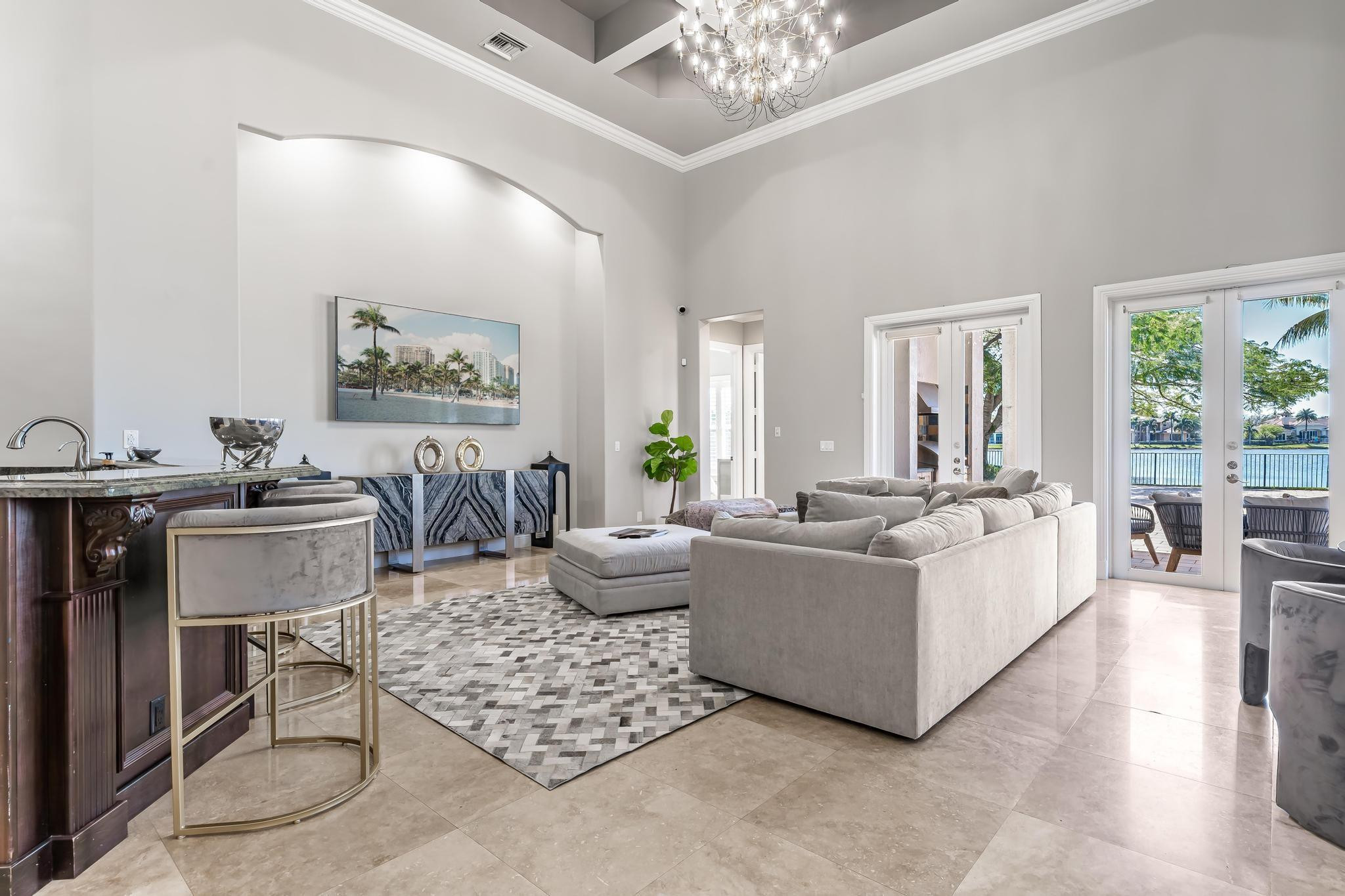 3111 Lake Ridge Lane Weston, FL 33332 - Photo 9 of 21 a living room with furniture and a large window