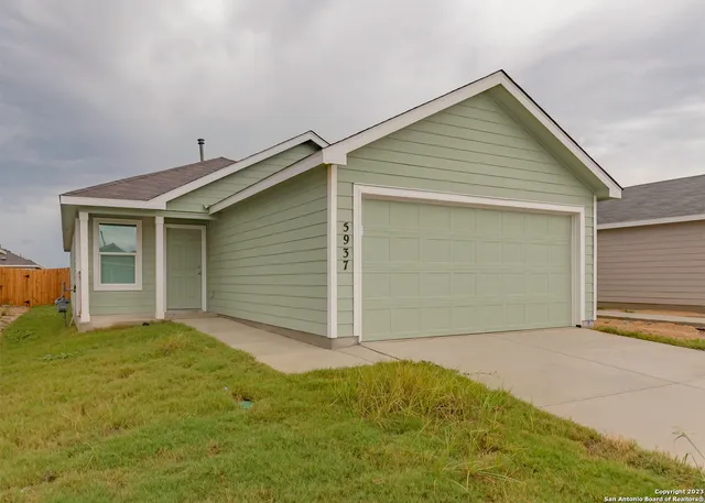 a view of backyard of house