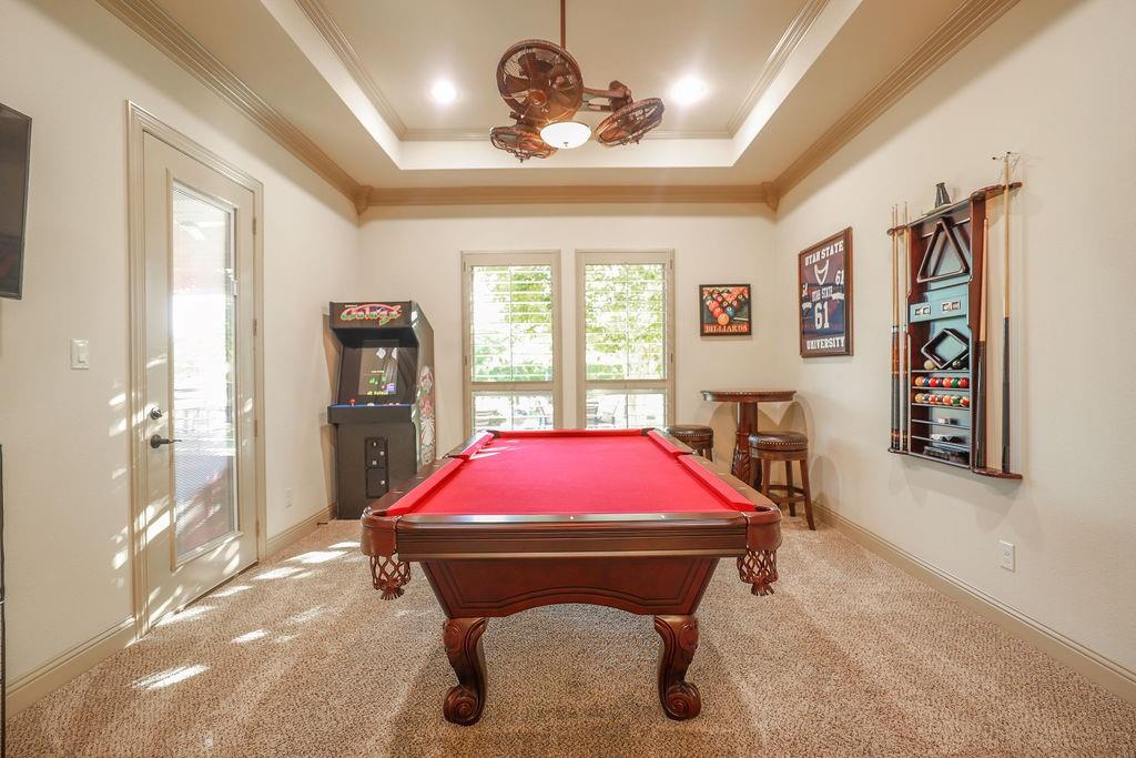 1387 Shadow Lakes Drive Wills Point, TX 75169 - Photo 11 of 30 Playroom with carpet, ornamental molding, a tray ceiling, and billiards