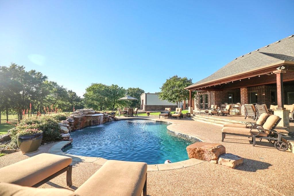 1387 Shadow Lakes Drive Wills Point, TX 75169 - Photo 26 of 30 Swimming pool with a patio