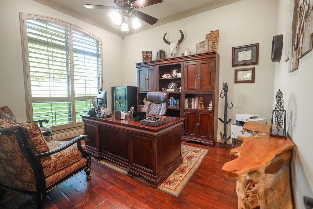 1387 Shadow Lakes Drive Wills Point, TX 75169 - Photo 10 of 30 Office space featuring ceiling fan, crown molding, plenty of natural light, and dark wood finished floors