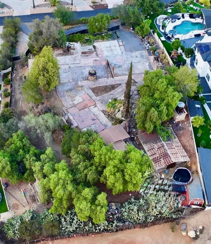 an aerial view of residential house with outdoor space