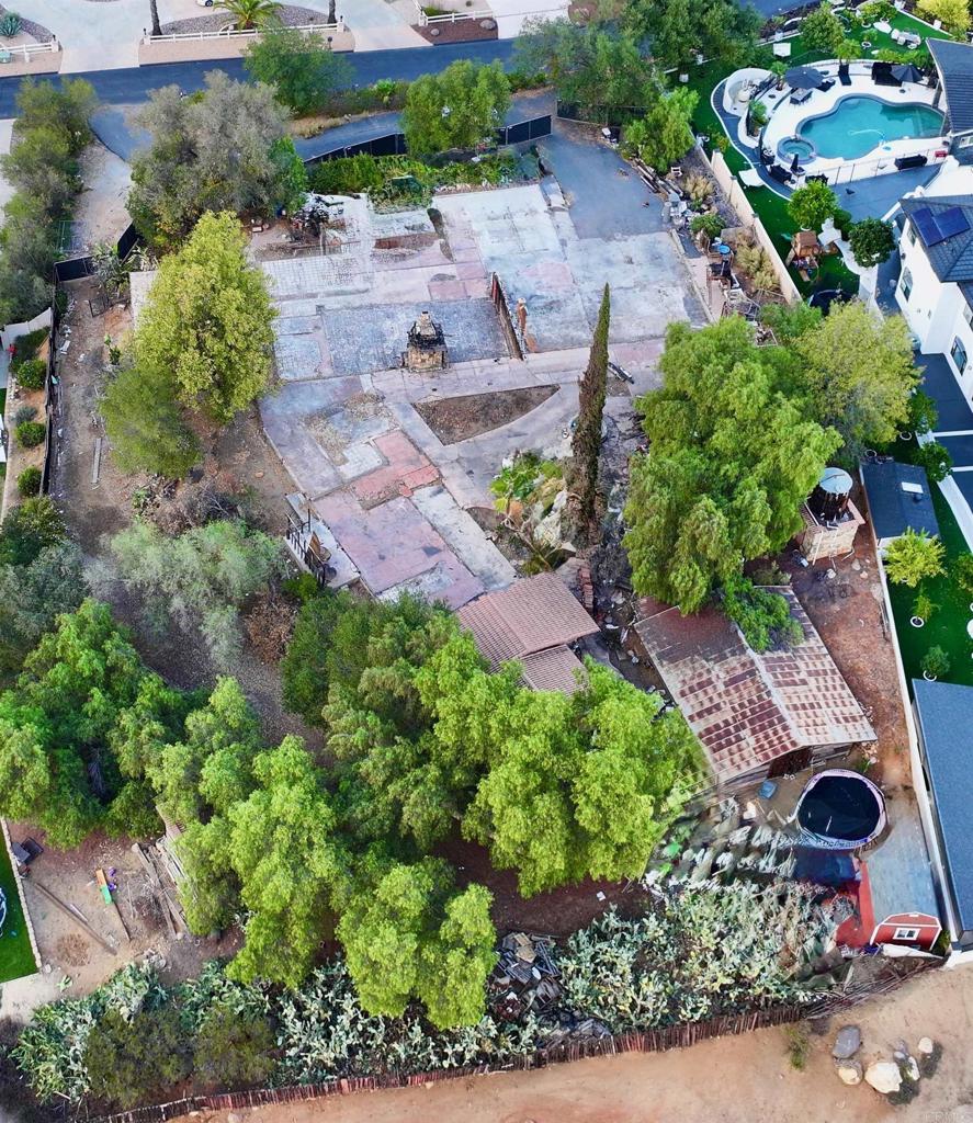 an aerial view of residential house with outdoor space
