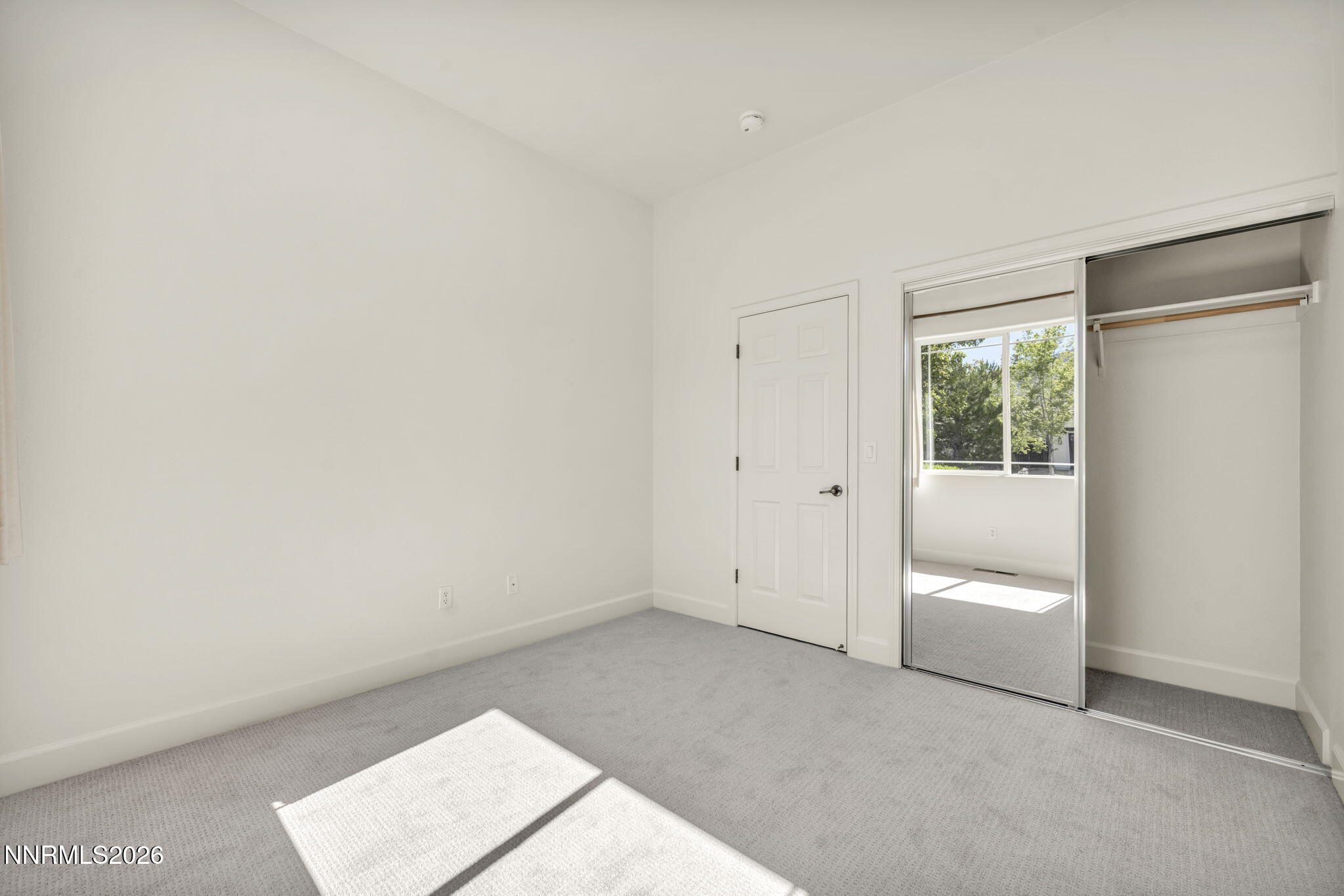 574 Echo Ridge Court Reno, NV 89511 - Photo 43 of 58 a view of an empty room with a window
