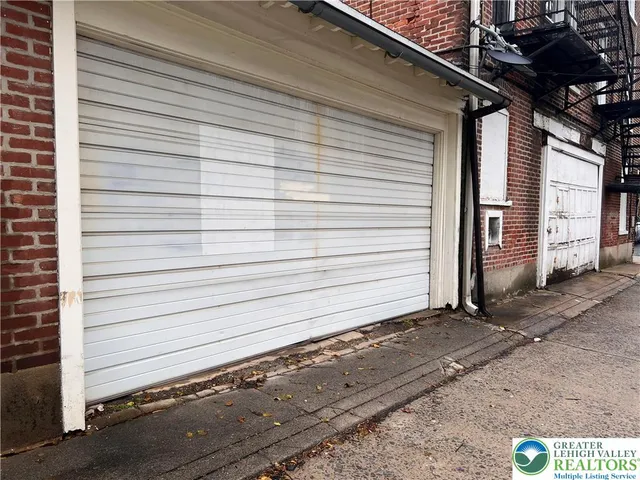 a view of a house with a garage