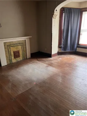 an empty room with windows