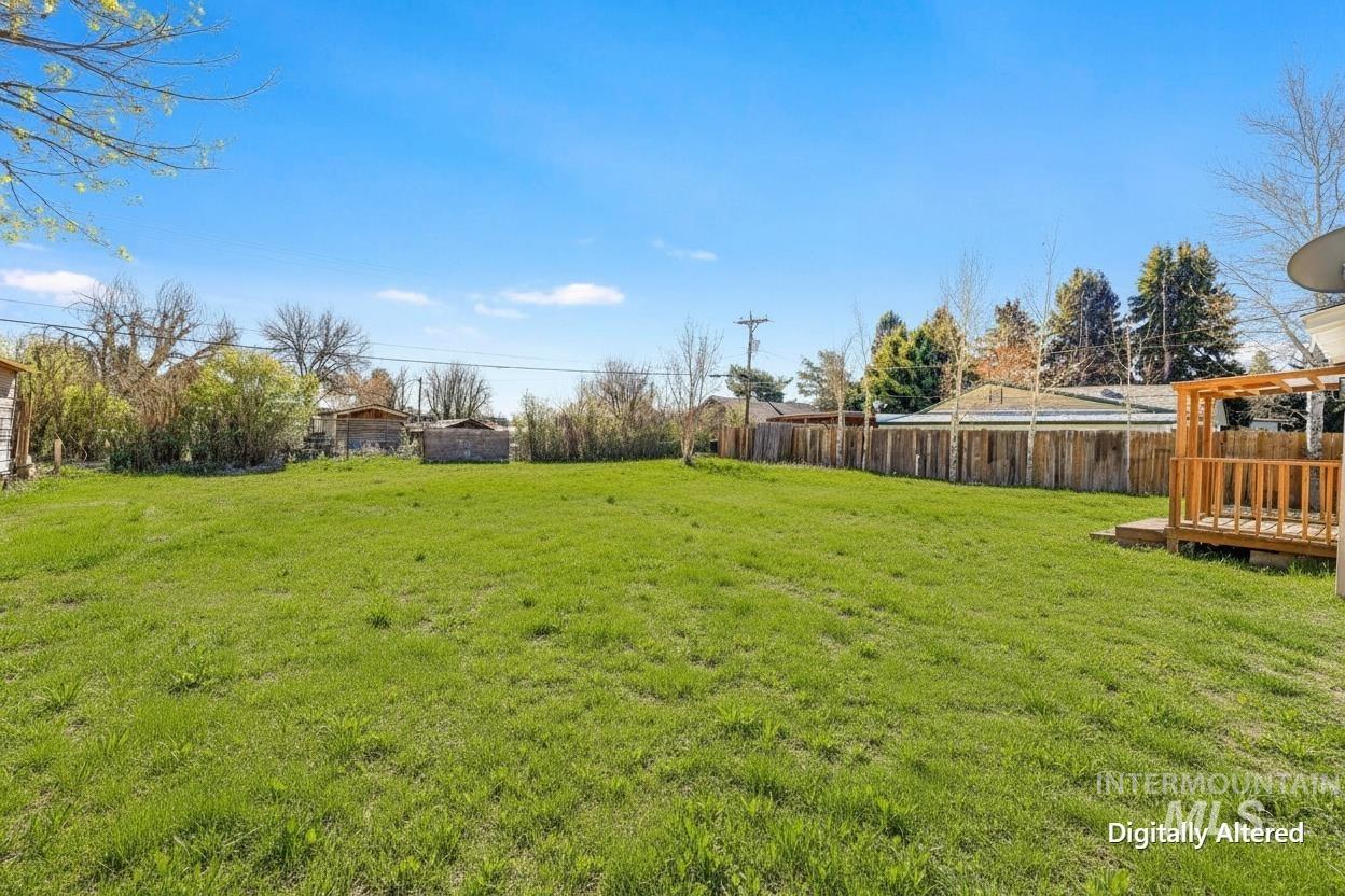 1226 Washington Street Gooding, ID 83330 - Photo 12 of 13 View of yard featuring a wooden deck