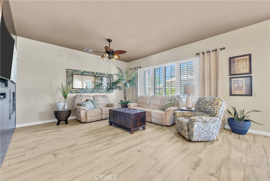 45407 Callesito Altar Temecula, CA 92592 - Photo 12 of 47 a living room with furniture and a large window