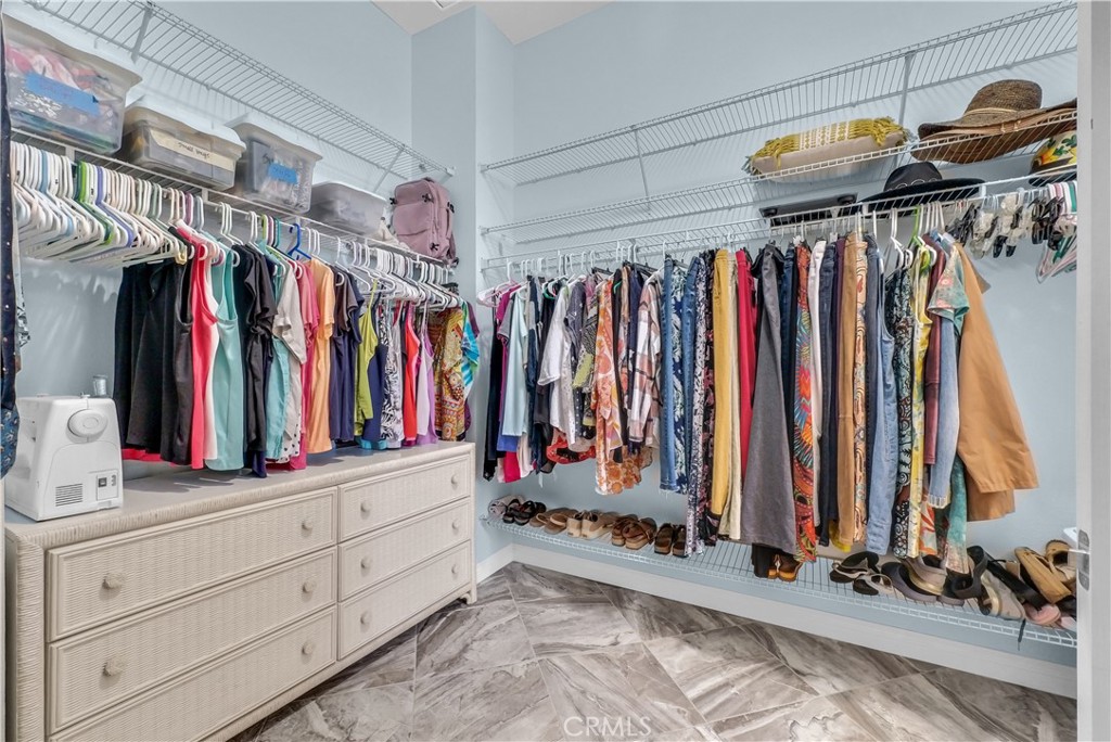 45407 Callesito Altar Temecula, CA 92592 - Photo 29 of 47 a view of walk in closet with clothes